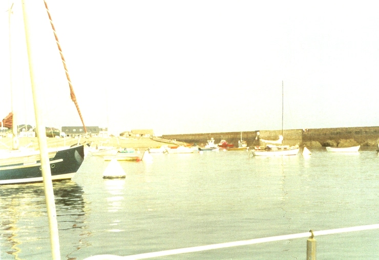 The inner moorings and the beach at Omonville